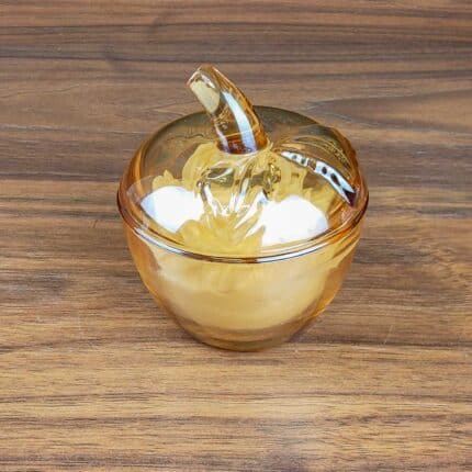 scented soy wax in a glass jar with a lid