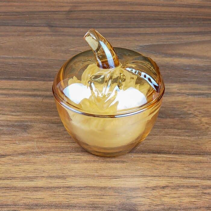 scented soy wax in a glass jar with a lid
