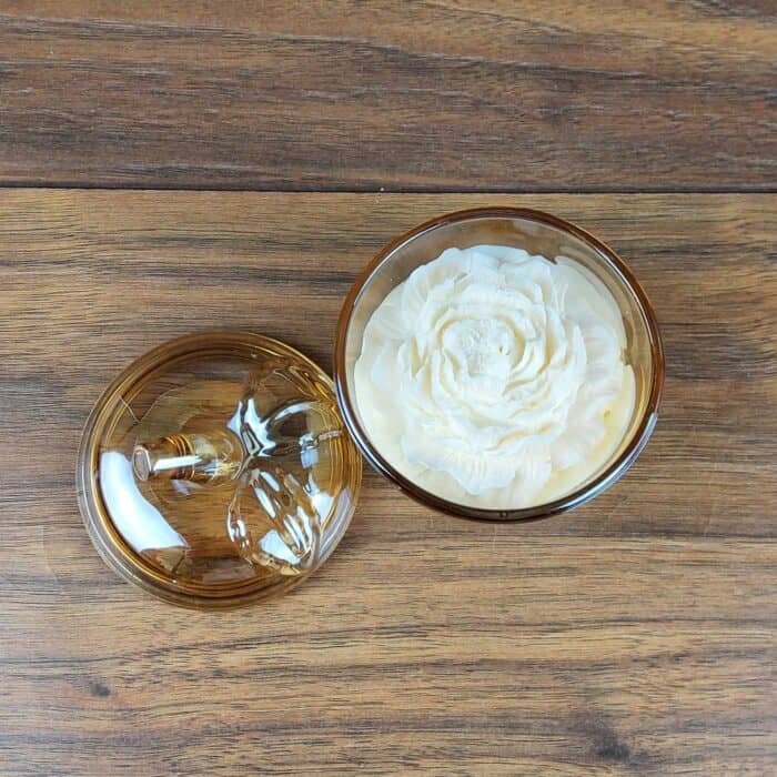 scented soy wax in a glass jar with a lid