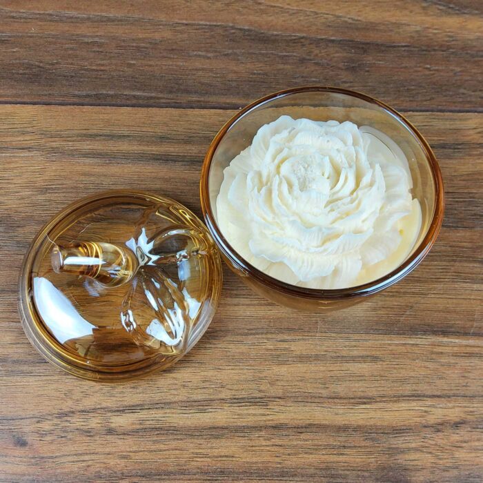 scented soy wax in a glass jar with a lid